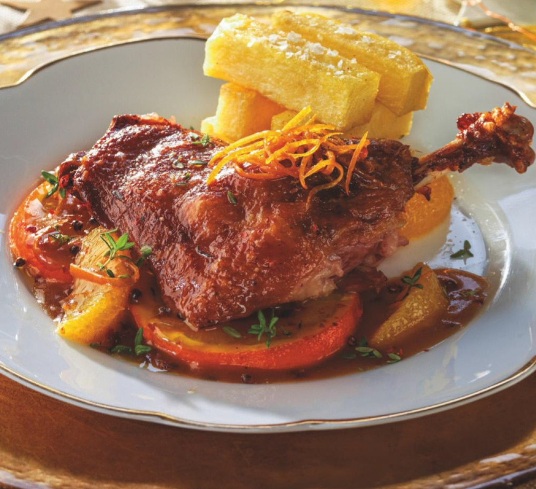 Confit de pato a la naranja con patatas pont neuf