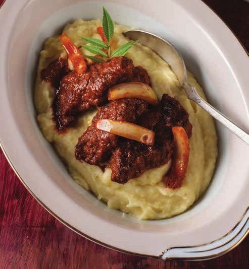 Hígado Saltado con Puré de Papa Amarilla