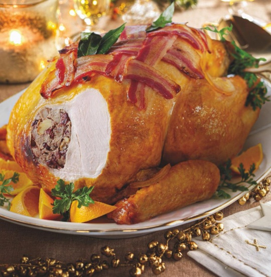 Pavo al whisky con rejilla de beicon y naranja